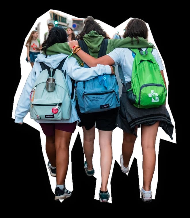 Three friends walking away, arms linked